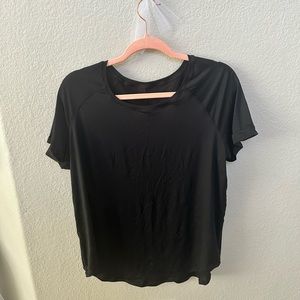 Black size 10 lululemon tee shirt slit back